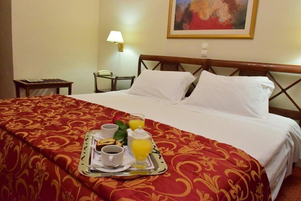 Postel nebo postele na pokoji v ubytování Hotel Galaxias