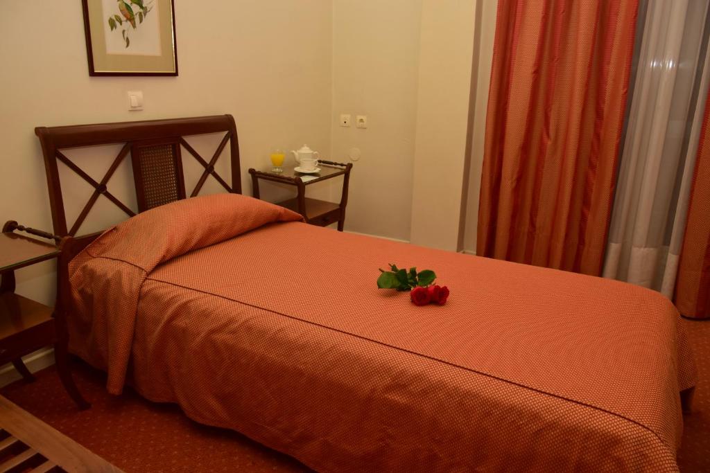 Postel nebo postele na pokoji v ubytování Hotel Galaxias