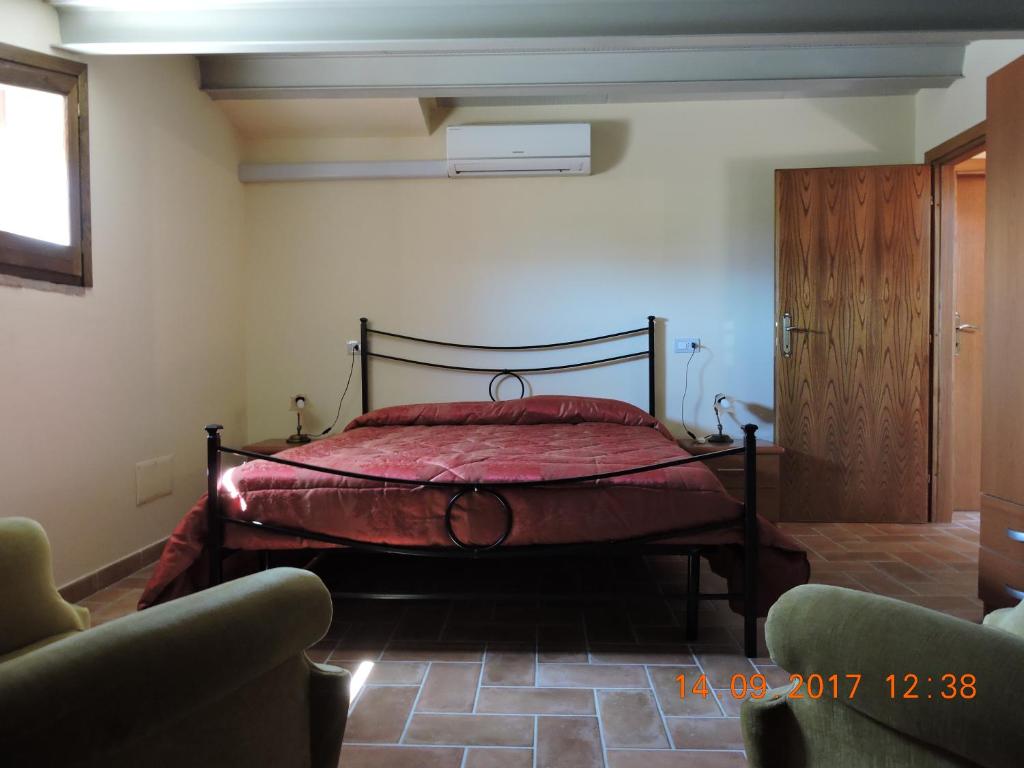 Postel nebo postele na pokoji v ubytování Casa Cardarella