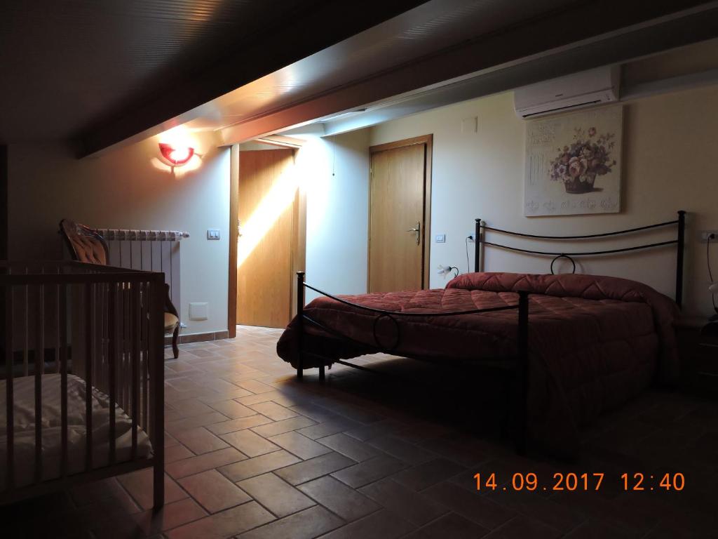 Postel nebo postele na pokoji v ubytování Casa Cardarella