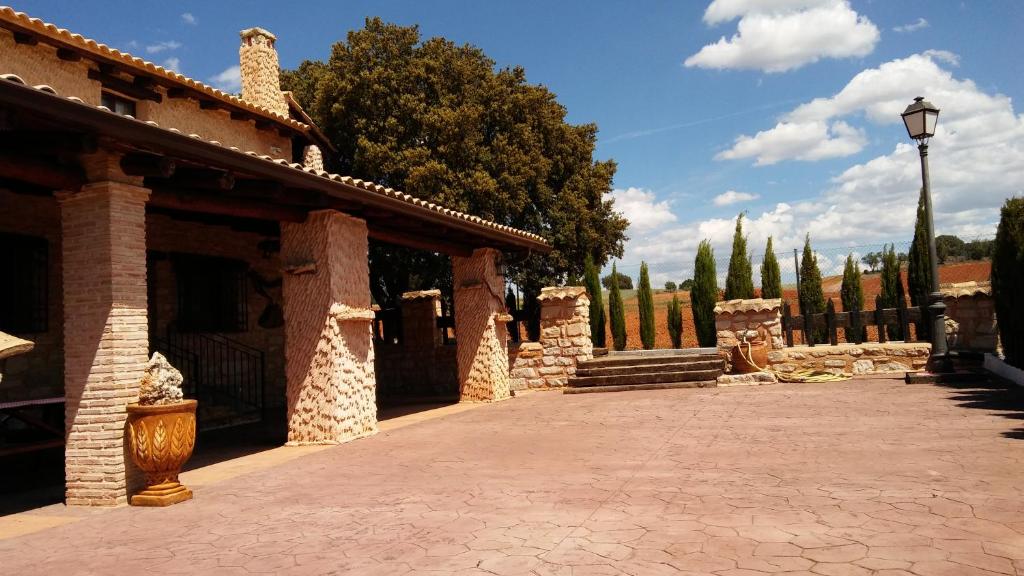 a courtyard of a house with a street light at Ruralvilla5 in Cuenca