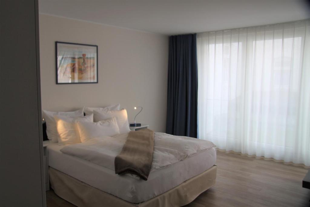 Letto o letti in una camera di Passepartout