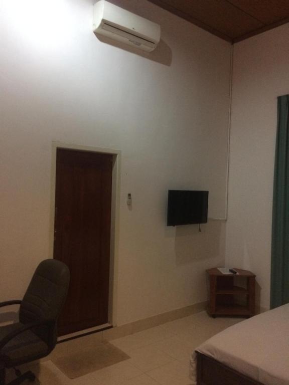 TV a/nebo společenská místnost v ubytování Wisma Maharani