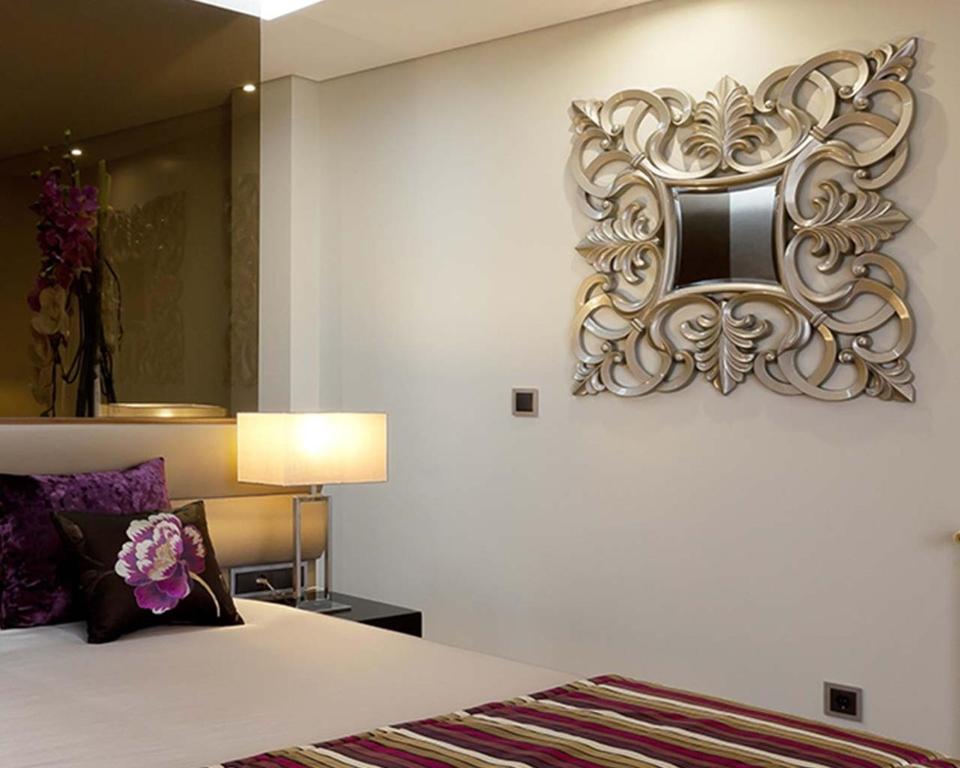 Postel nebo postele na pokoji v ubytování Cardal Hotel