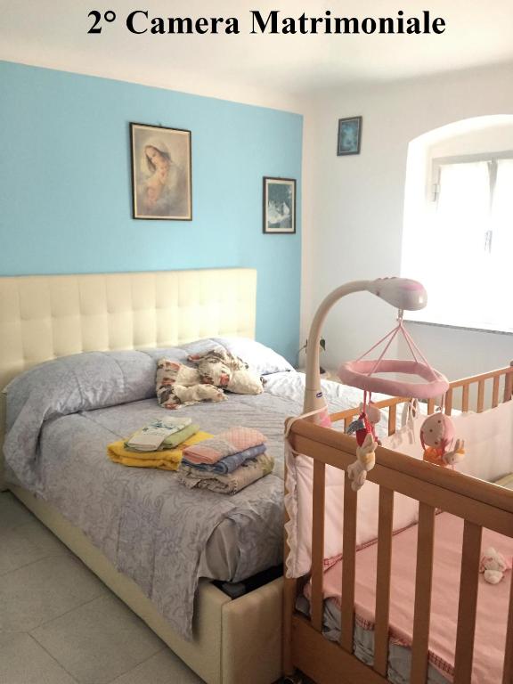 Postel nebo postele na pokoji v ubytování Marika's Home