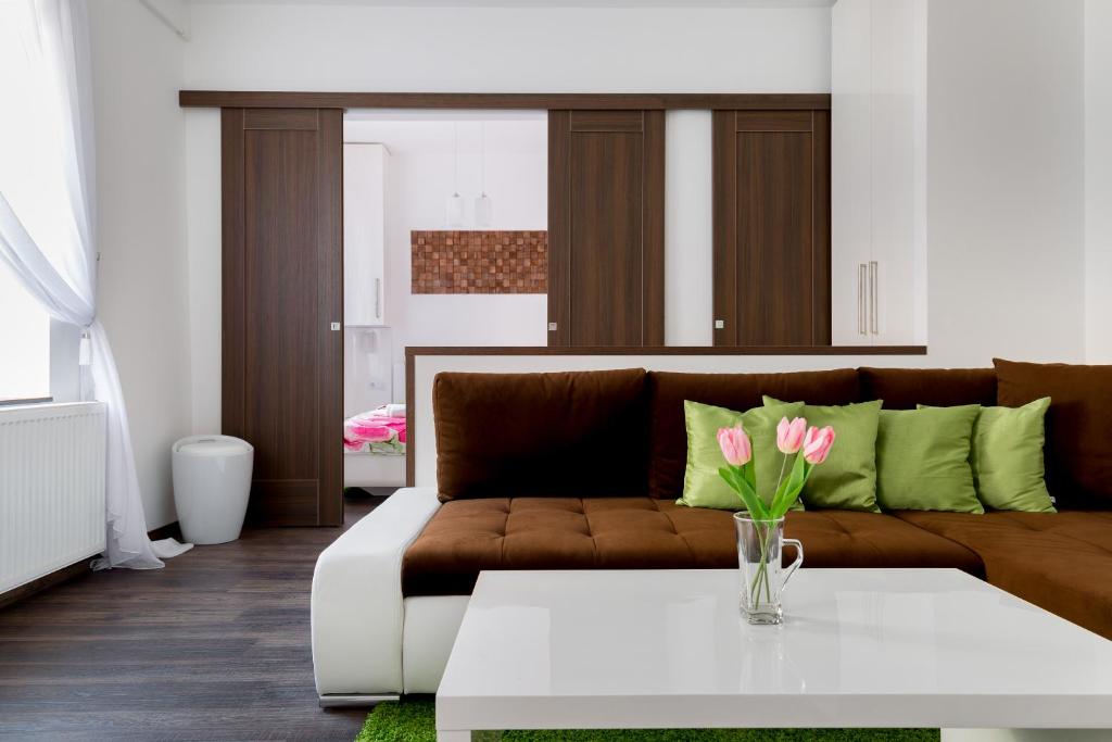 a living room with a couch and a table at Parliament Dream Home In The Center in Budapest