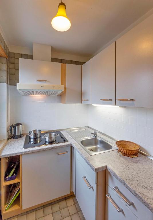 Kuchyň nebo kuchyňský kout v ubytování Appartements Erika