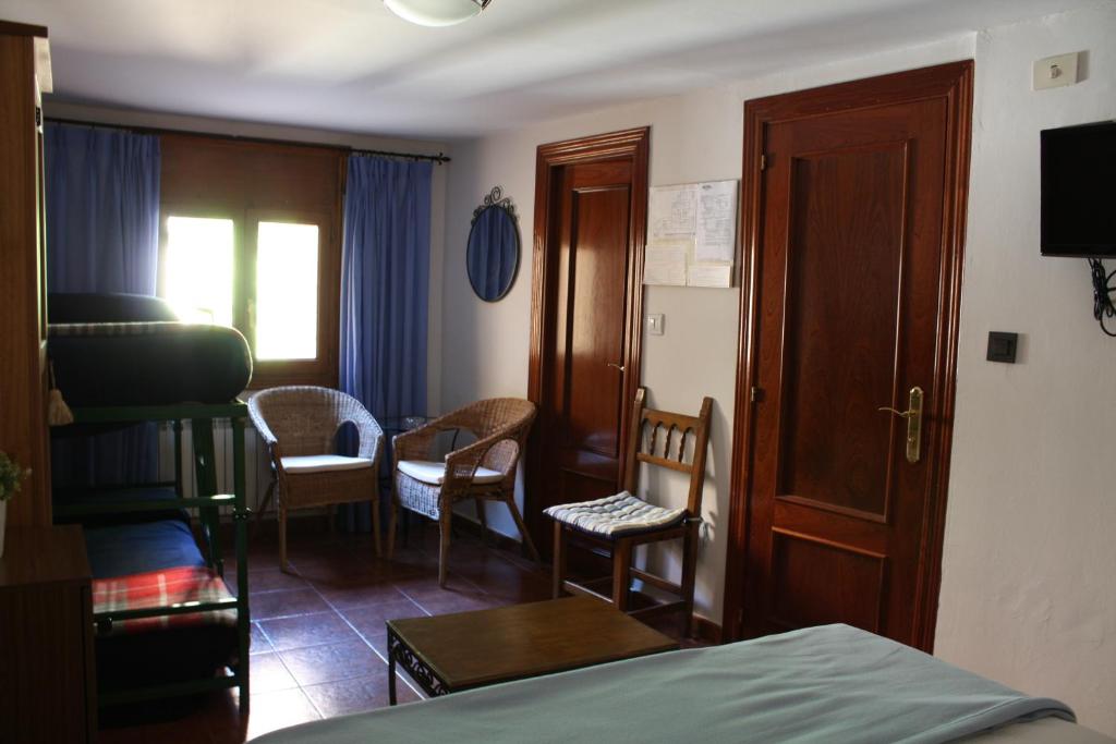 Posezení v ubytování Hotel Mesón del Gallo
