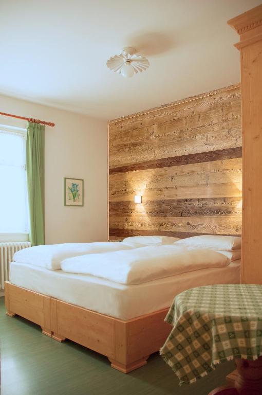 Postel nebo postele na pokoji v ubytování Hotel Oasi