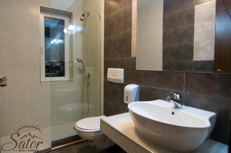 Koupelna v ubytování Hotel Šator