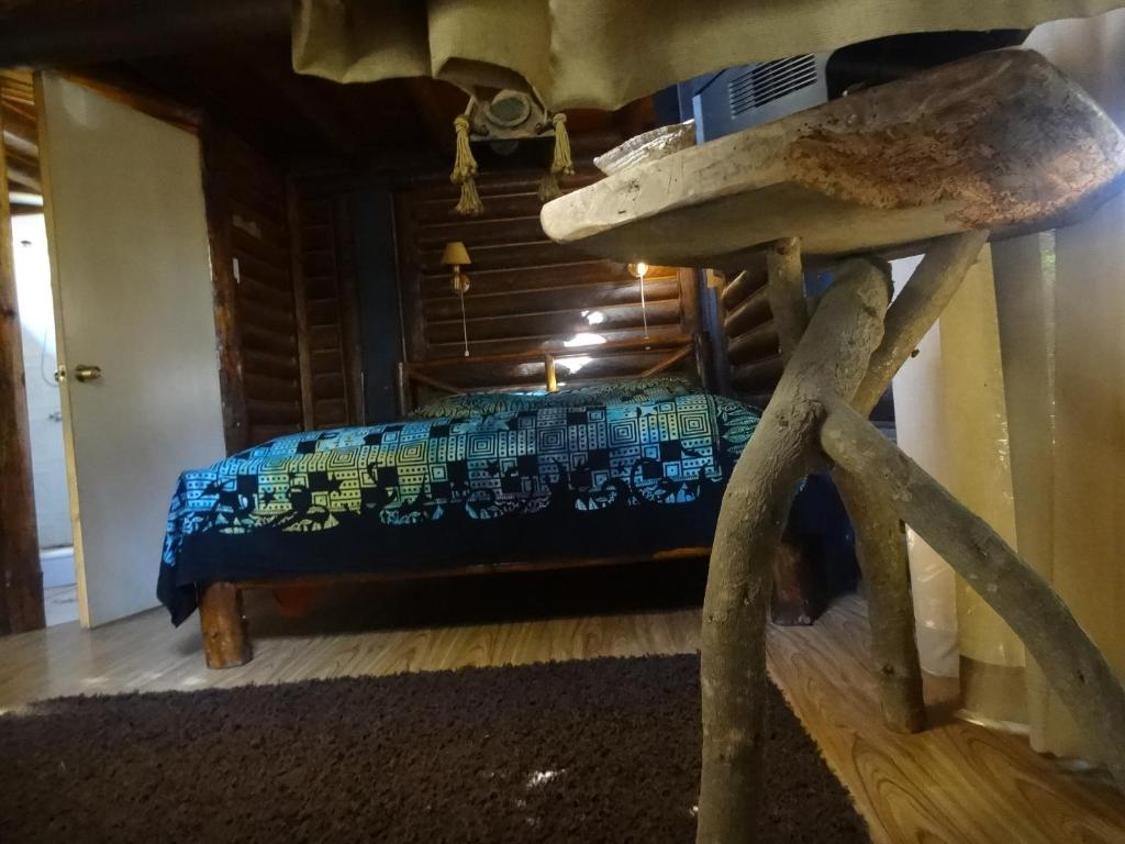 Postel nebo postele na pokoji v ubytování Cabanas Curi-Huapi
