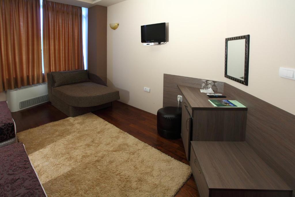 TV a/nebo společenská místnost v ubytování Hotel Šator