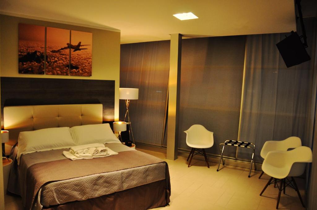 Postel nebo postele na pokoji v ubytování Star Hotel Airport Verona