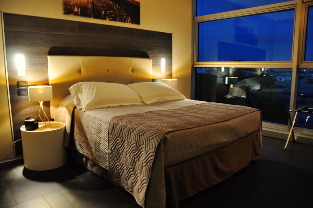 Postel nebo postele na pokoji v ubytování Star Hotel Airport Verona