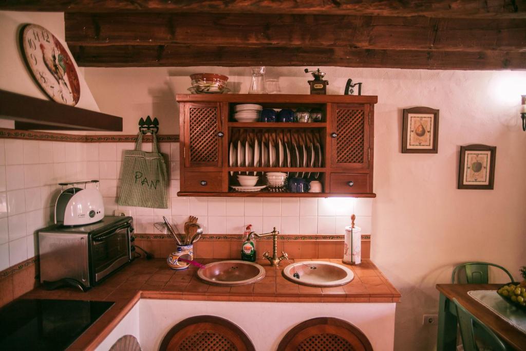Kuchyň nebo kuchyňský kout v ubytování Casa Morera
