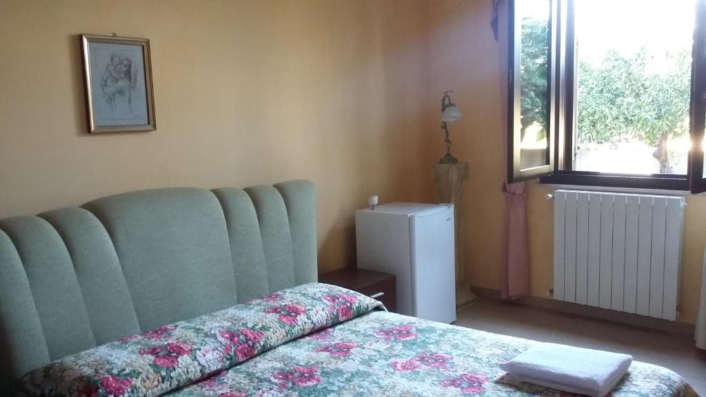 Postel nebo postele na pokoji v ubytování B&B Castellazzo