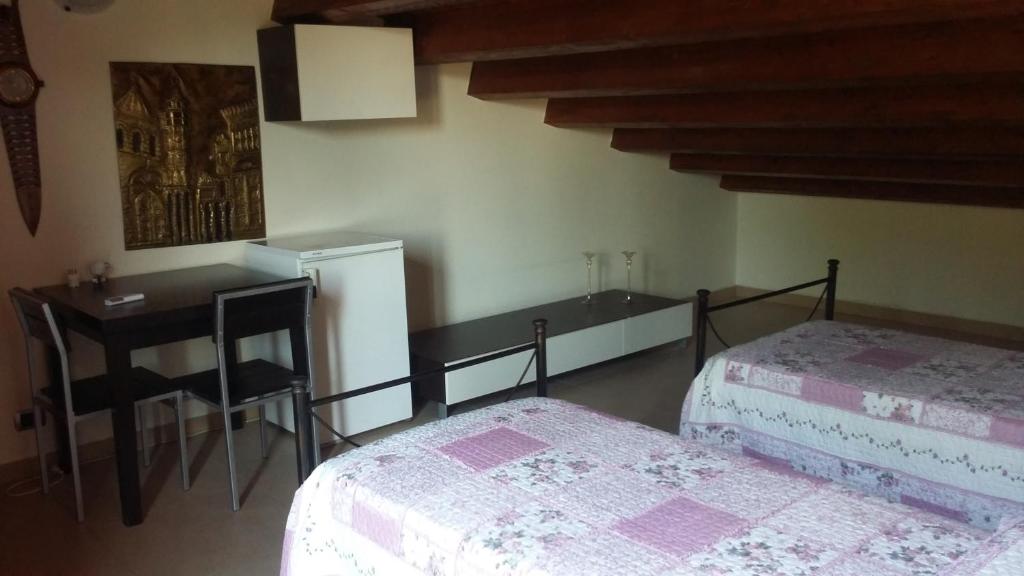 Postel nebo postele na pokoji v ubytování B&B Castellazzo