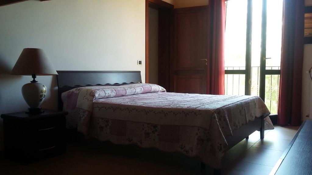 Postel nebo postele na pokoji v ubytování B&B Castellazzo