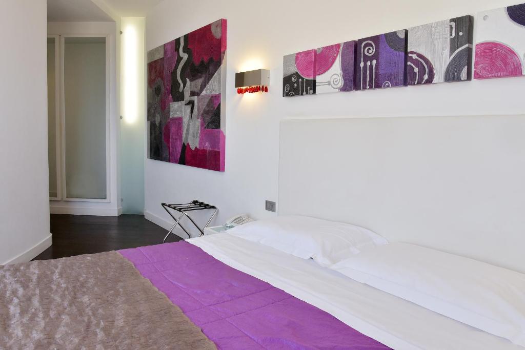 Postel nebo postele na pokoji v ubytování Hotel Exclusive
