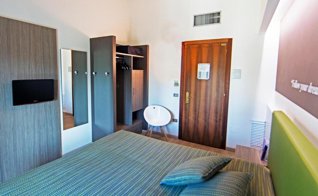 TV a/nebo společenská místnost v ubytování Hotel Ideal