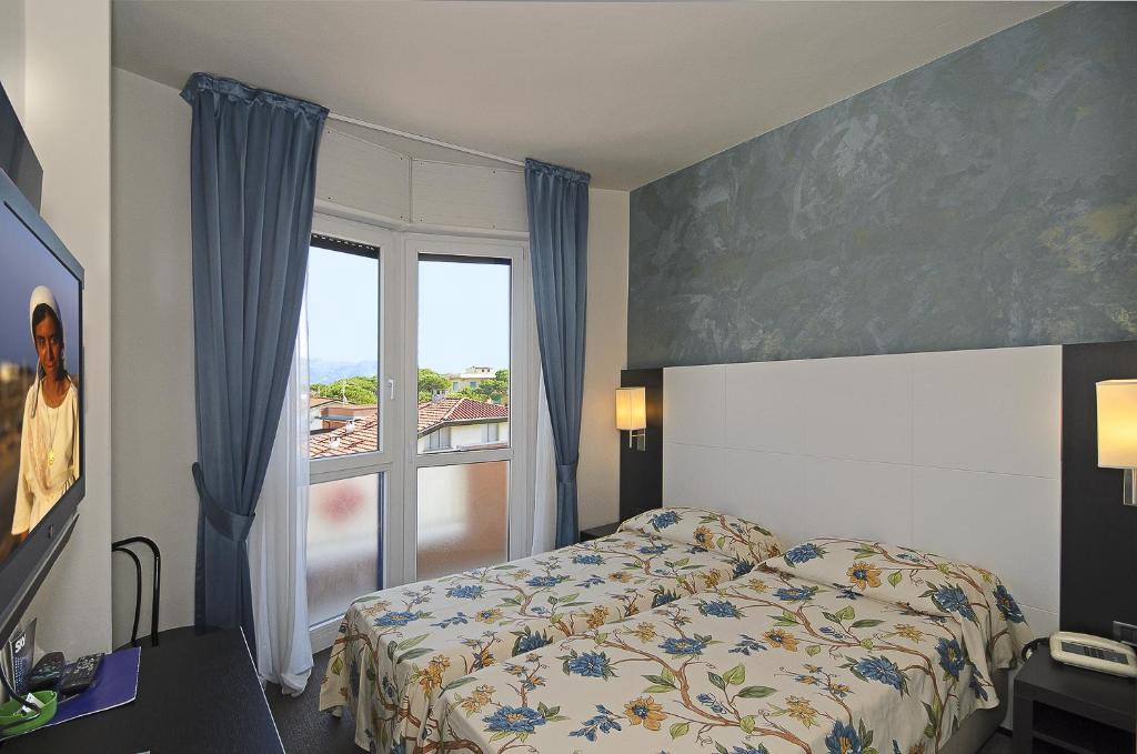 Postel nebo postele na pokoji v ubytování Hotel Eur