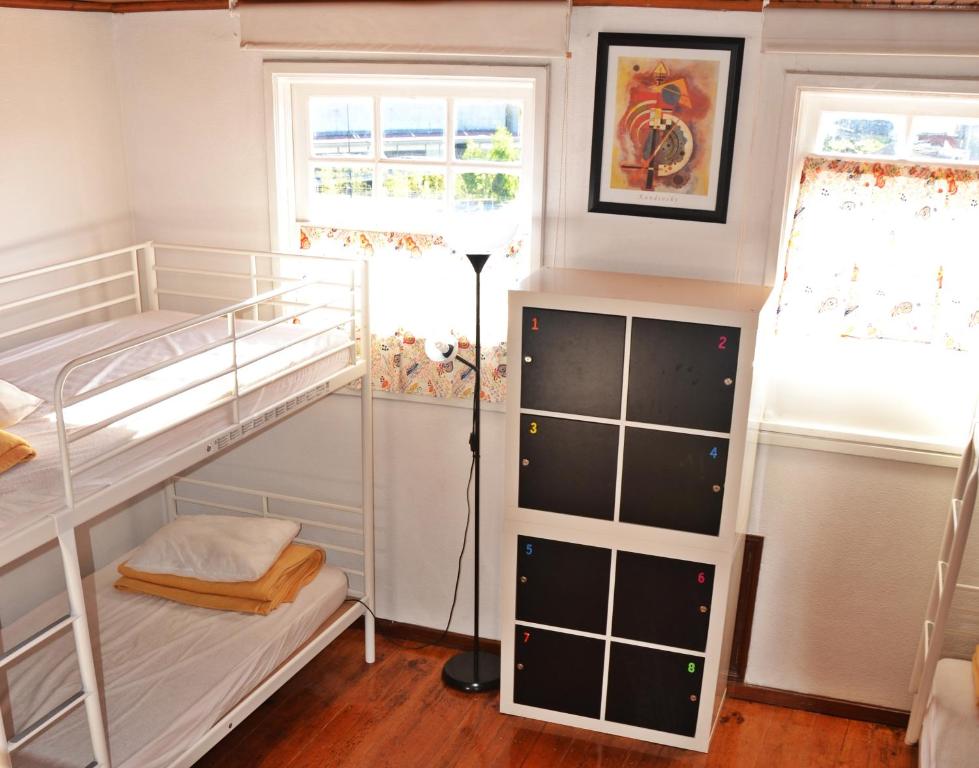 Postel nebo postele na pokoji v ubytování Hostel Prime Guimaraes