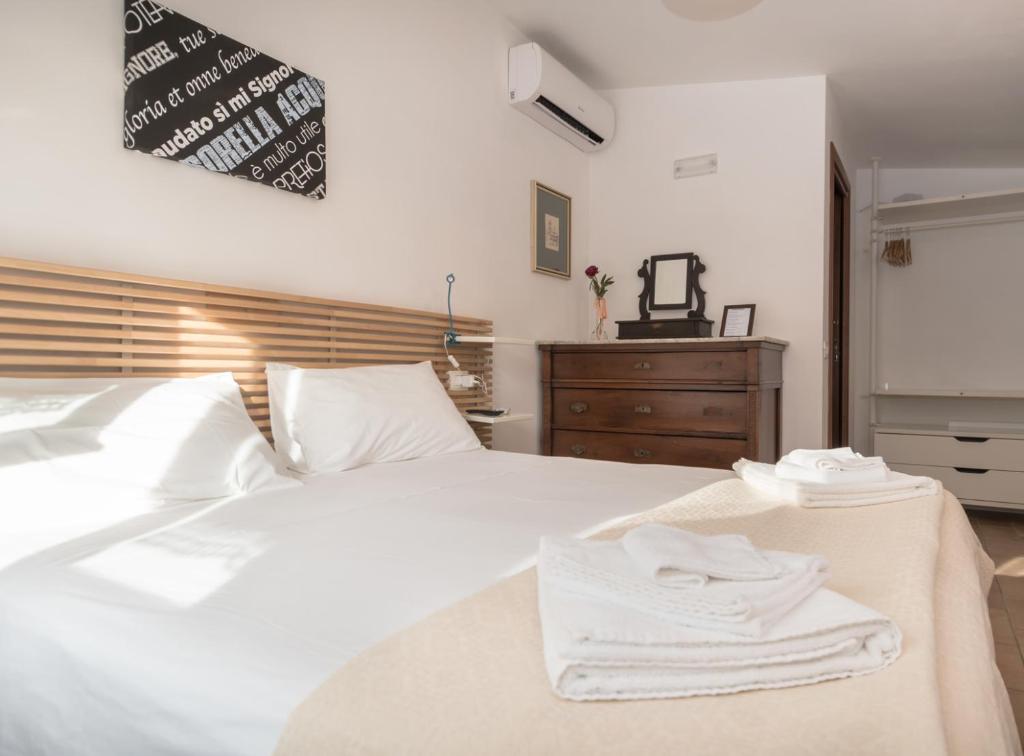 Postel nebo postele na pokoji v ubytování B&B Cantico Delle Creature