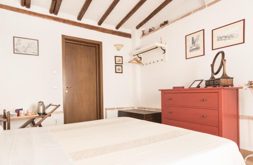 Postel nebo postele na pokoji v ubytování B&B Cantico Delle Creature