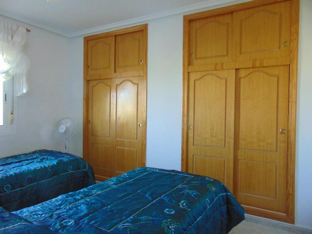 Postel nebo postele na pokoji v ubytování Casa Nikki