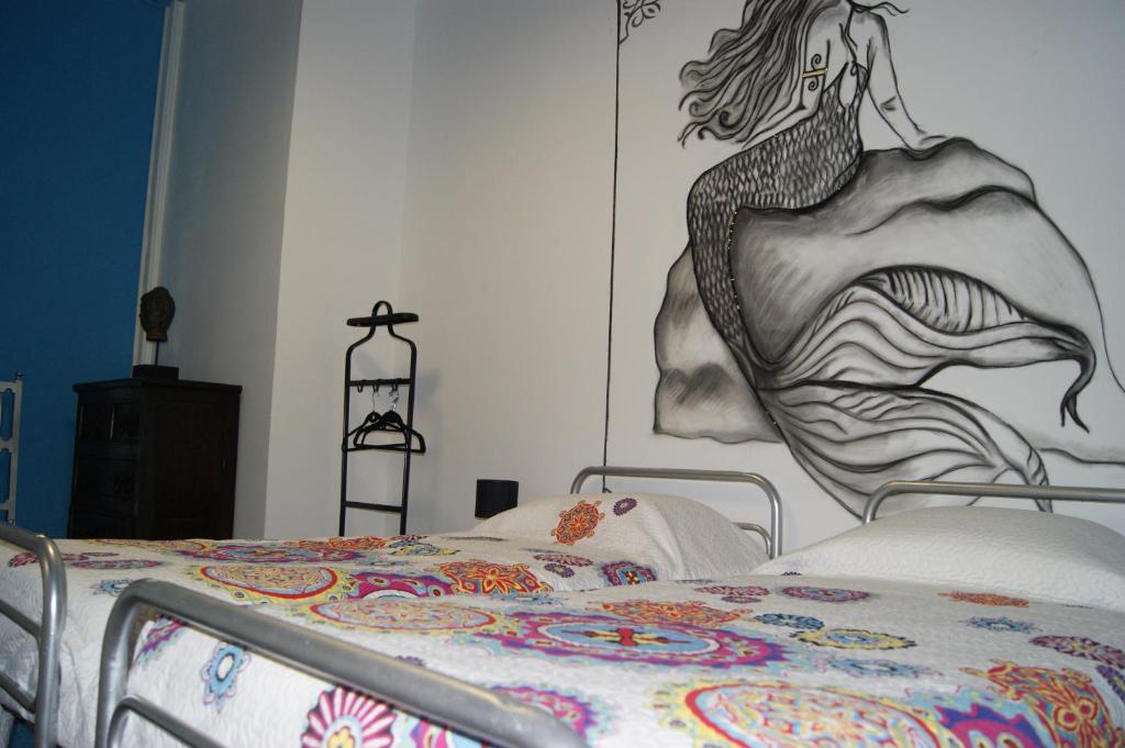 Postel nebo postele na pokoji v ubytování Azores Dream Hostel