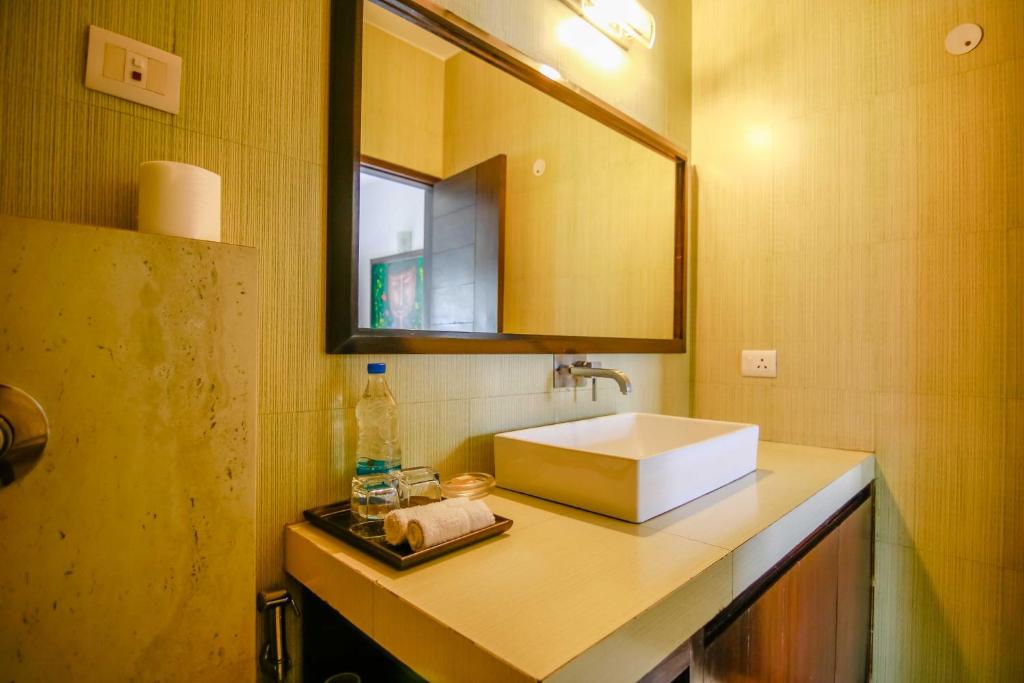 Postel nebo postele na pokoji v ubytování Thikana Delhi ( Boutique B&B)