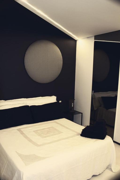 Postel nebo postele na pokoji v ubytování Ananke B&B