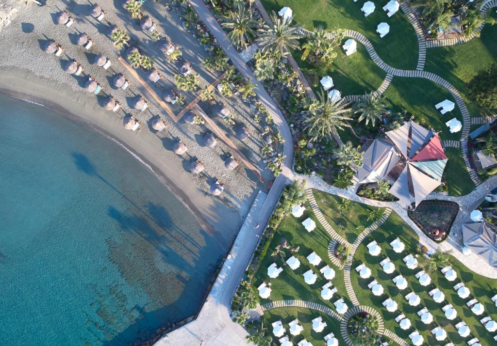 an overhead view of a beach and the water at Amathus Beach Hotel Limassol in Limassol