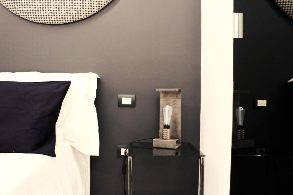 Postel nebo postele na pokoji v ubytování Ananke B&B