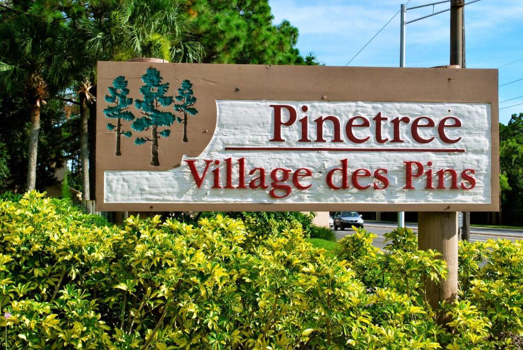 a sign for a pinehurst village pharmacy at LUX VILLAs on beautiful Palmer Ranch in Vamo