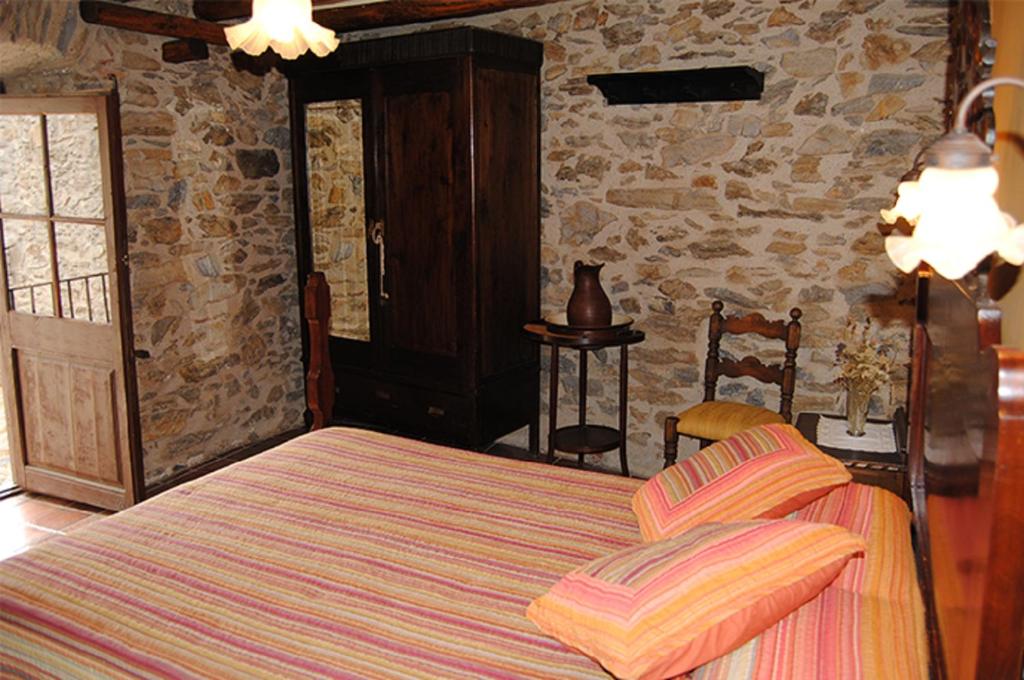 Postel nebo postele na pokoji v ubytování Apartaments turistics Moli Can Coll