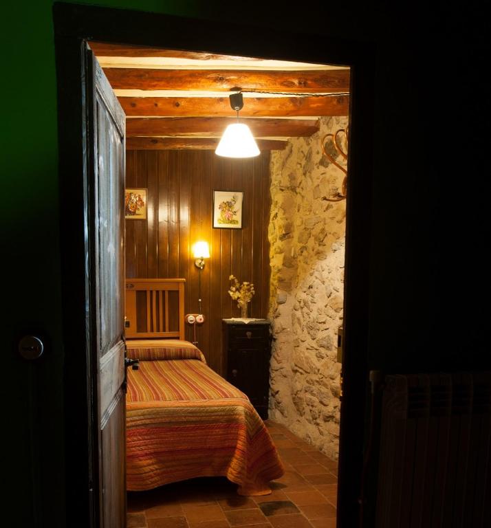 Postel nebo postele na pokoji v ubytování Apartaments turistics Moli Can Coll