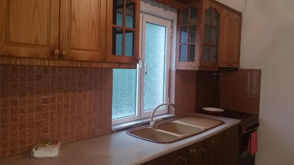 Kuchyň nebo kuchyňský kout v ubytování Vrenjo GuestHouse