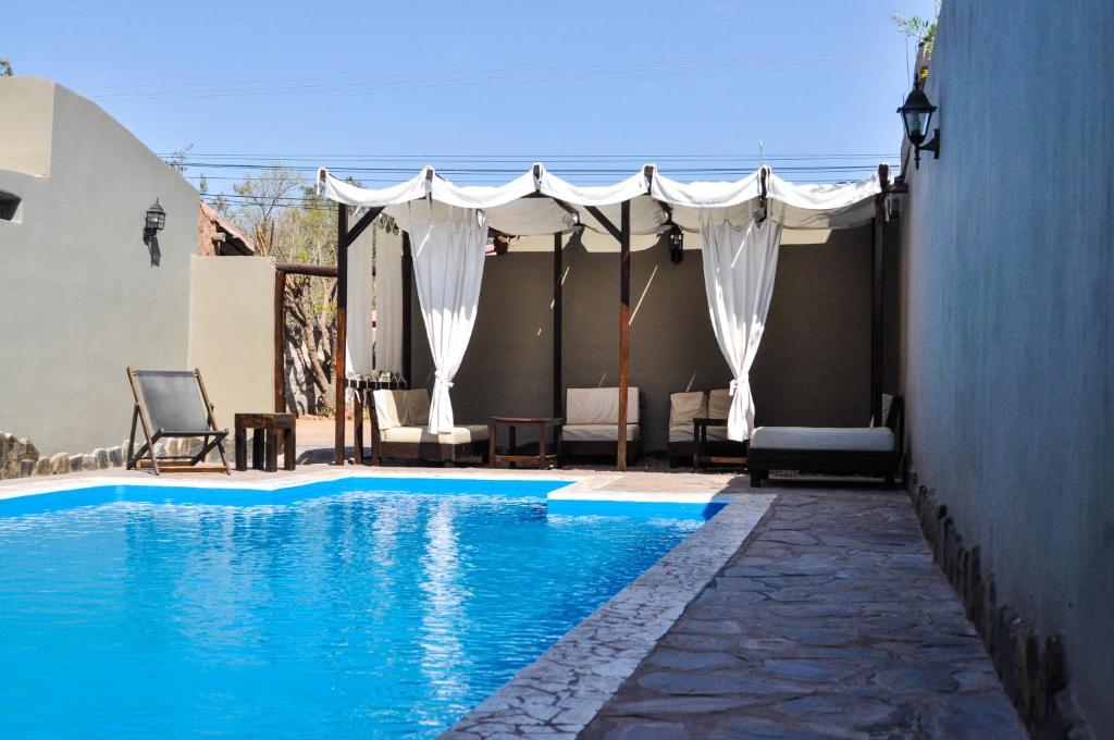Swimming pool sa o malapit sa Casagrande Hotel de Adobe