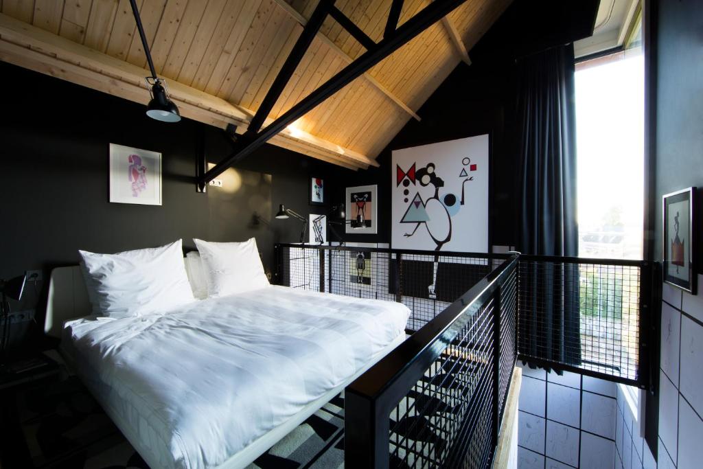 Postel nebo postele na pokoji v ubytování Design Hotel Modez