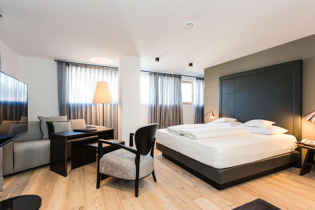 Postel nebo postele na pokoji v ubytování Hotel MAYR