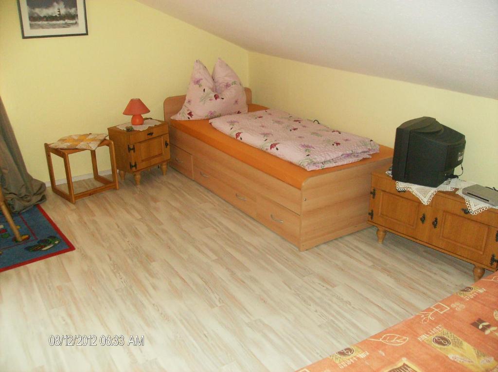 Postel nebo postele na pokoji v ubytování Pension Sabine