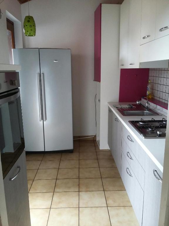Kuchyň nebo kuchyňský kout v ubytování Casa Avezza