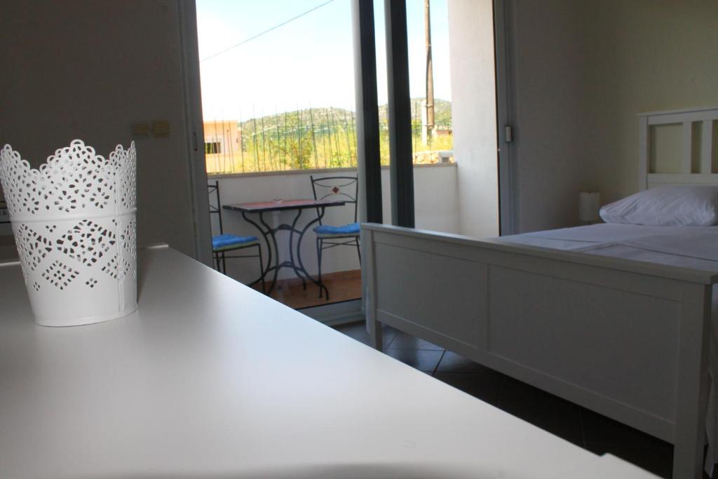 Postel nebo postele na pokoji v ubytování Apartments Yerkovic