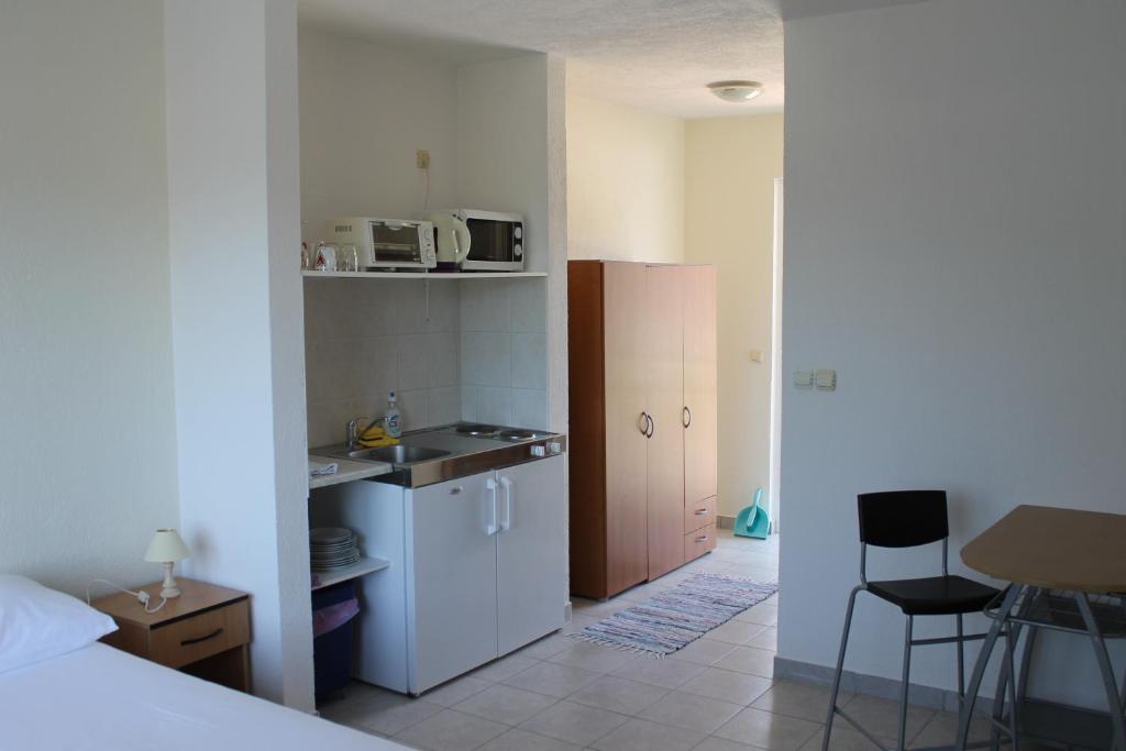 Kuchyň nebo kuchyňský kout v ubytování Apartments Yerkovic
