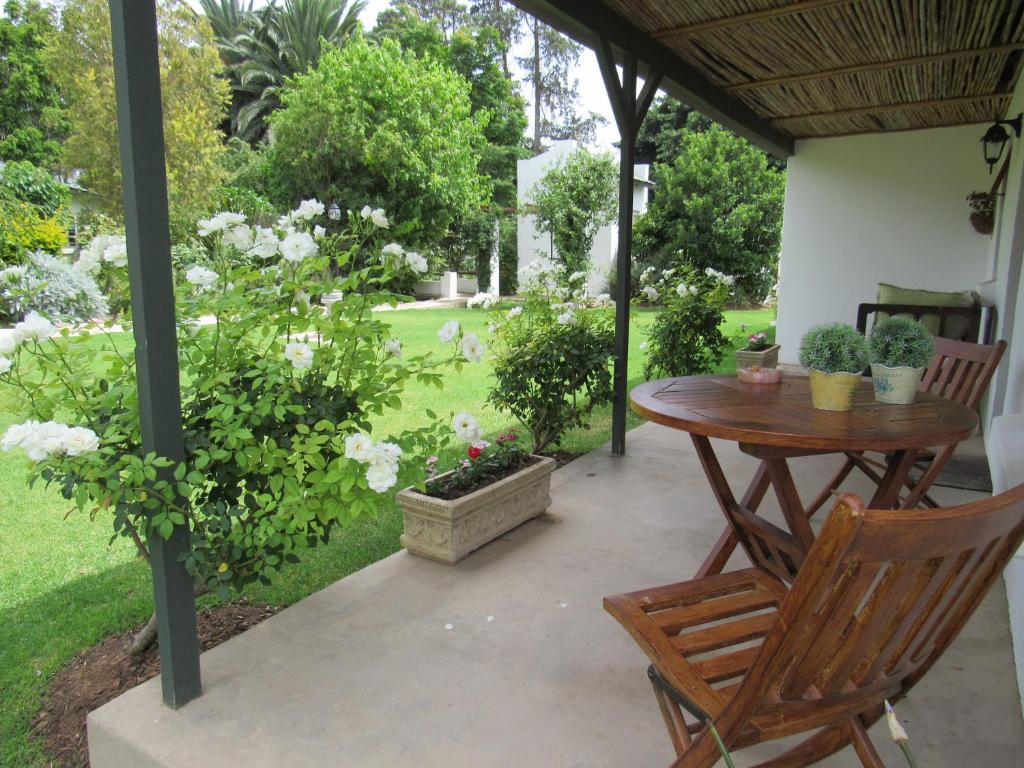 Un jardín fuera de Happy Lands Farmstay