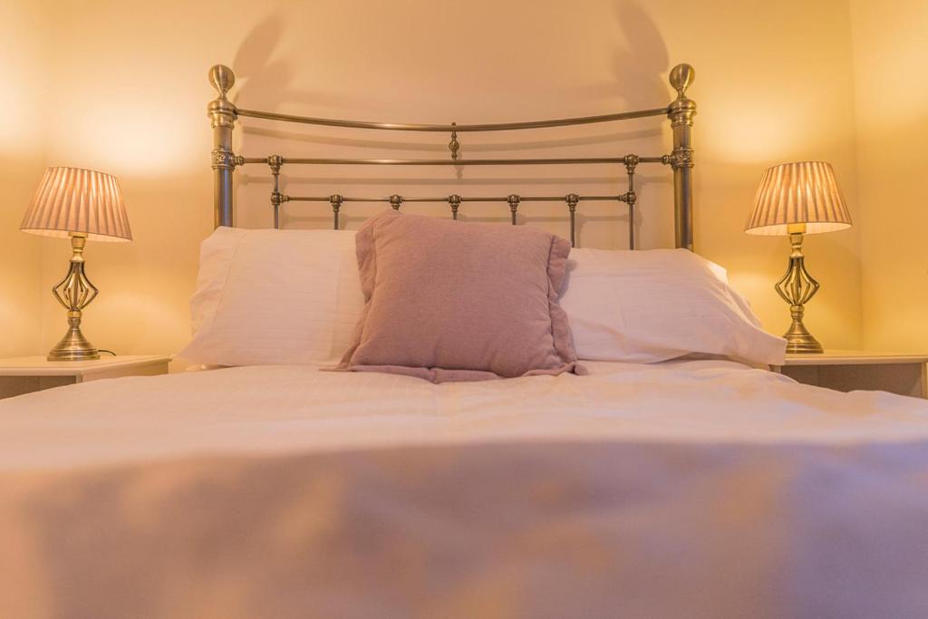 Postel nebo postele na pokoji v ubytování Dorney's B&B