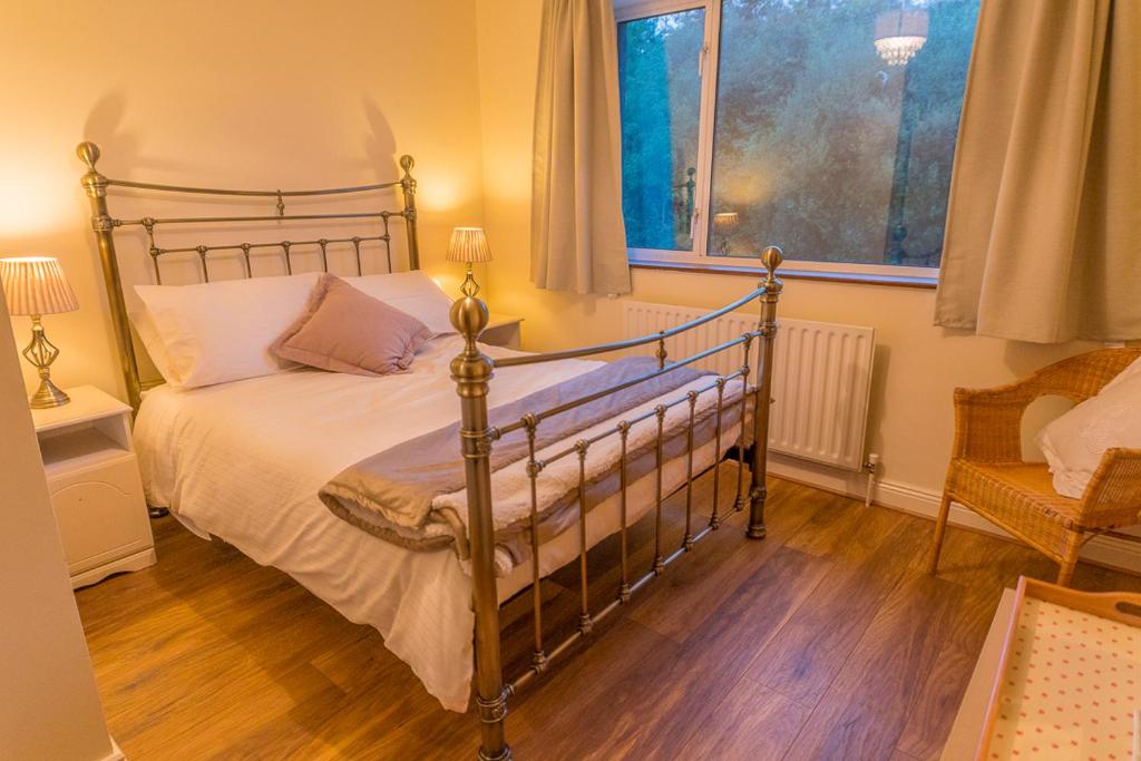 Postel nebo postele na pokoji v ubytování Dorney's B&B