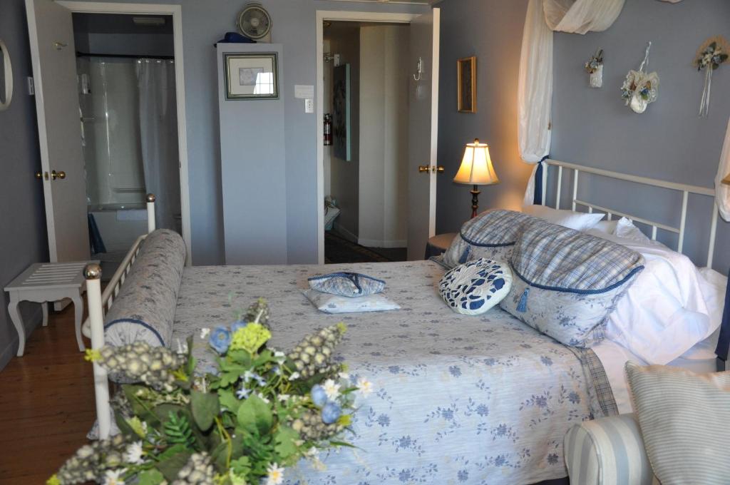 Voodi või voodid majutusasutuse Auberge sur la Côte toas