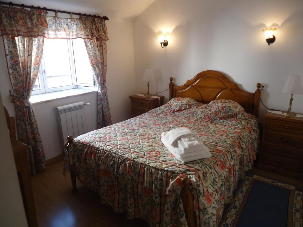 Postel nebo postele na pokoji v ubytování Hotel Aviz